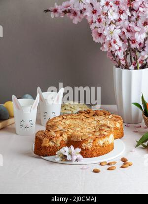 Colomba - traditional italian easter dove cake with glaze, macaranage, almonds Stock Photo