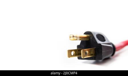 Power plug Type B from an extension cord for outdoor use. Close up. Fits American standard NEMA 5-15 electrical sockets. Used in Canada, United states Stock Photo