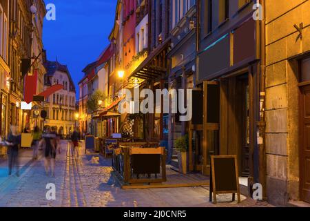 Streets of Torun in evening Stock Photo