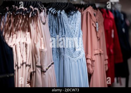 Berlin, Germany. 02nd Mar, 2022. Dresses hang in the women's department at the C&A clothing store in a shopping center in Berlin-Marzahn. Credit: Fabian Sommer/dpa/Alamy Live News Stock Photo