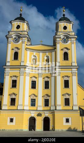 The former monastery church and today's Basilica of St. Michael in Mondsee, Salzkammergut, Upper Austria Stock Photo