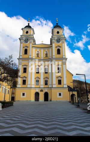 The former monastery church and today's Basilica of St. Michael in Mondsee, Salzkammergut, Upper Austria Stock Photo