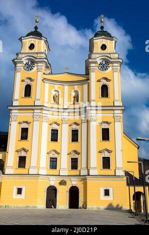 The former monastery church and today's Basilica of St. Michael in Mondsee, Salzkammergut, Upper Austria Stock Photo