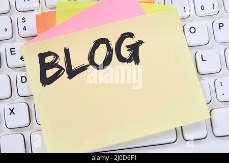 Blog writing blogger online on the internet computer business concept notepad Stock Photo