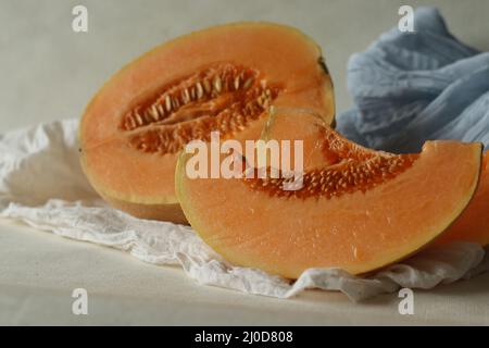 Muskmelon, also known as Cucumis melo, is a species of melon belongs to gourd family. It has ribbed, netted or smooth skin and a sweet, or bland flavo Stock Photo