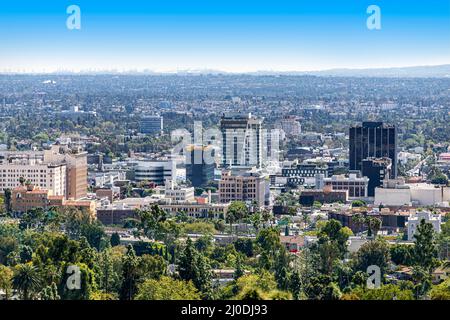 Downtown city view of Santa Monica as seen from the Hollywood Reservoir dam during a beautiful, bright day. Stock Photo