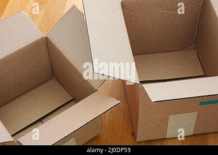 Two empty open cardboard boxes. Close up. Stock Photo