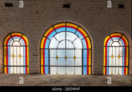 Stained glass windows at the catholic church Stock Photo