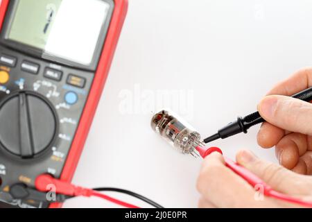 Testing an electrical tube Stock Photo