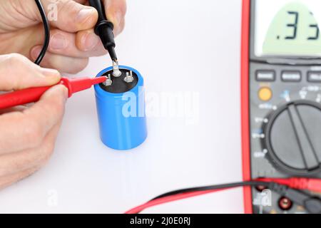 Measuring an electrical device Stock Photo