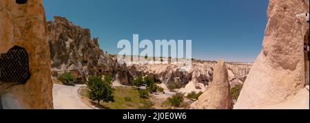 Panoramic view of Goreme Open Air Museum from the Dark Church in Cappadocia. Travel to Turkey or Cappadocia background banner photo. Stock Photo