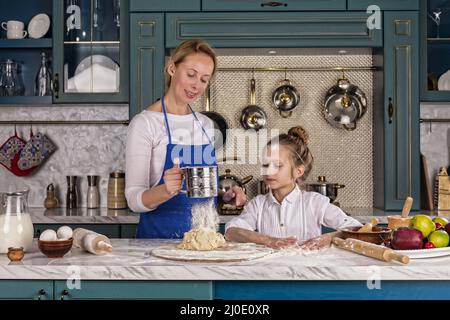 Mother, daughter, girl,  prepare bakery, Home cooking Stock Photo