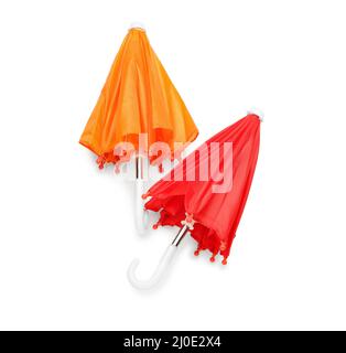 Two colorful umbrellas on white background Stock Photo