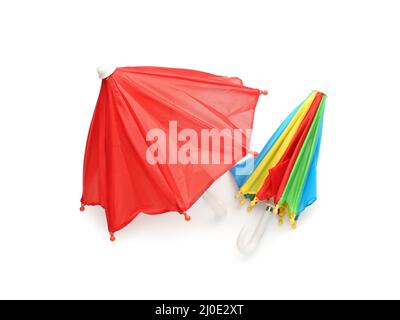 Two colorful umbrellas on white background Stock Photo