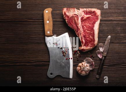 T-bone and meat cleaver Stock Photo