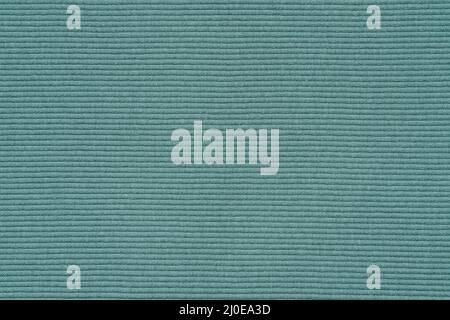Green jersey texture. Knit cloth background. Ribbed jersey fabric. Stock Photo