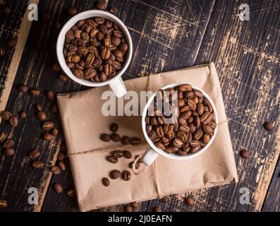 Coffee beans in a cups Stock Photo