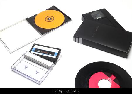 Vinyl record, cd, audio and video cassettes top view Stock Photo
