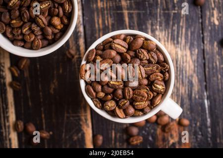 Coffee beans in a cups Stock Photo