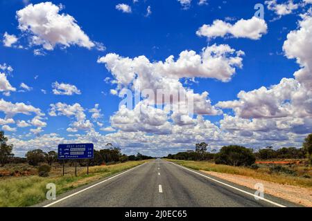 Information roadside sign with distances to rest stops area on Barrier highway in Australian outback. Stock Photo