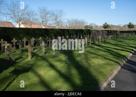 Le Mans, France - February 27, 2022: The west cemetery in Le Mans contains Belgium, French,American, Polish, Commonwealth and German graves.  Sunny wi Stock Photo