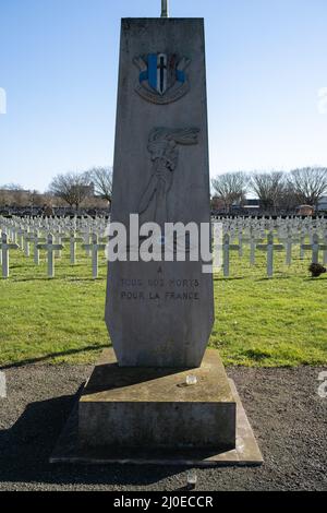 Le Mans, France - February 27, 2022: The west cemetery in Le Mans contains Belgium, French,American, Polish, Commonwealth and German graves.  Sunny wi Stock Photo