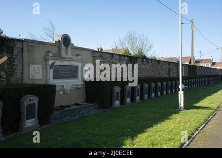 Le Mans, France - February 27, 2022: The west cemetery in Le Mans contains Belgium, French,American, Polish, Commonwealth and German graves.  Sunny wi Stock Photo