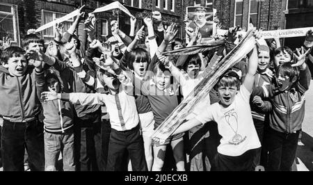 Wayne Ashe (right) leads the cheers from the Loyal Liverpool fans at Anfield Junior Boys School ahead of their side's European Cup Final match against Club Bruges at Wembley this evening.10th May 1978. Stock Photo