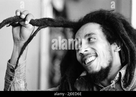 Jamaican singer Bob Marley seen here in interview with the Daily Mirror following the ban on his performing in London due to the amount of muggings and pickpocketings that occurred at his last concert. Marley who is a quiet and pleasant person devoted to World Peace is annoyed that he ban from London due to a few violent and irresponsible people. 22. June 1978 Stock Photo