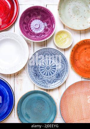 Set of different empty plates Stock Photo