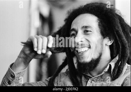 Jamaican singer Bob Marley seen here in interview with the Daily Mirror following the ban on his performing in London due to the amount of muggings and pickpocketings that occurred at his last concert. Marley who is a quiet and pleasant person devoted to World Peace is annoyed that he ban from London due to a few violent and irresponsible people, 22nd June 1978 Stock Photo