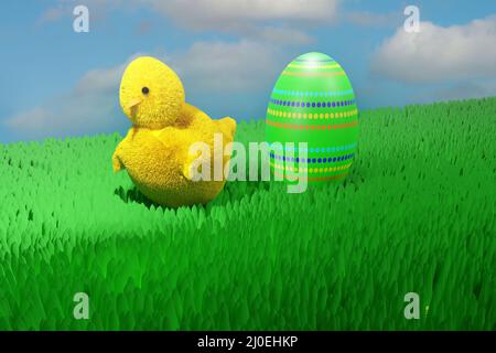 Baby chicken with Easter egg in the meadow. Stock Photo