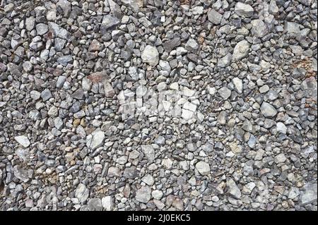 detail of a gravel floor prepared for asphalt paving on a road or highway Stock Photo
