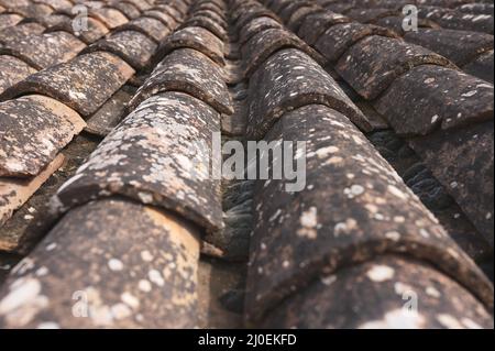 detail of an old roof with arabic tile or curved roof tile Stock Photo