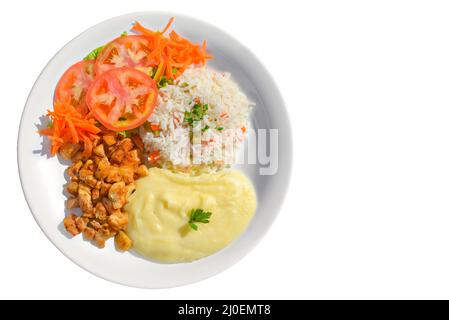 Chicken garnished with rice, mashed potatos and salad Stock Photo