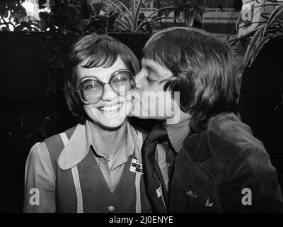 Stars of new film, Star Wars, attend news press conference at the Holiday Inn Hotel in Birmingham, 25th January 1978. Miss J Bridge receives a kiss from Mark Hamill who plays the character Luke Skywalker. Stock Photo