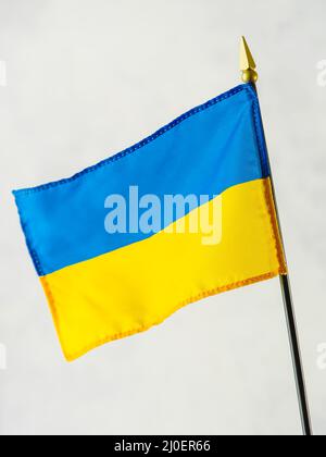Ukrainian state flag on a white background. Symbol of patriotism, independence, freedom. Plans for membership in the European Union. Fight for freedom Stock Photo