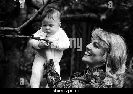 Esther Rantzen at home with her baby daughter Emily. 15th May 1978. Stock Photo