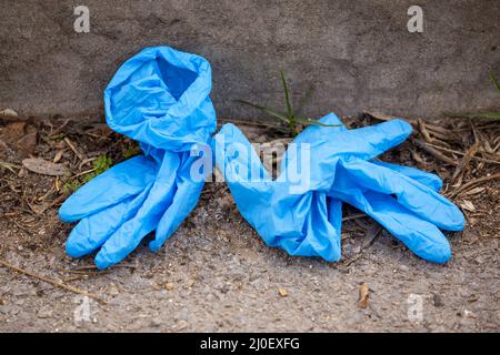 Blue latex surgical gloves Stock Photo