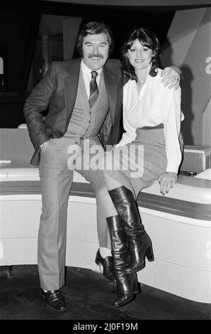 ITV's 'World of Sport' presenter Dickie Davies with his new director Patricia Mordecai. London Weekend Television Studios, London. 2nd January 1979. Stock Photo