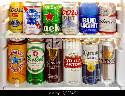 Calgary, Alberta, Canada. Jun 9 2020. A beer fridge with world famous beer brands on a mini fridge. Stock Photo