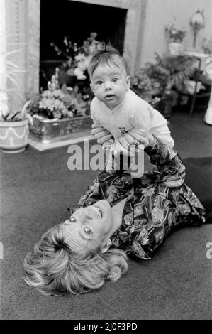 Esther Rantzen at home with her baby daughter Emily. 15th May 1978. Stock Photo