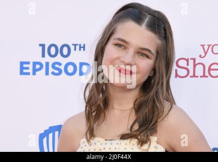 Raegan Revord arrives at the Premiere Of Warner Bros. 100th Episode Of