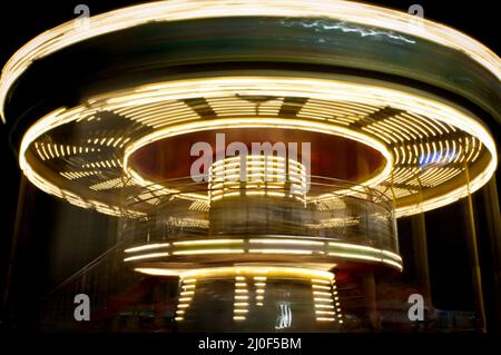 Merry go round, Carousel park game spinning around. Stock Photo