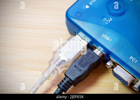 Computer KVM digital Switch with connected cables Stock Photo