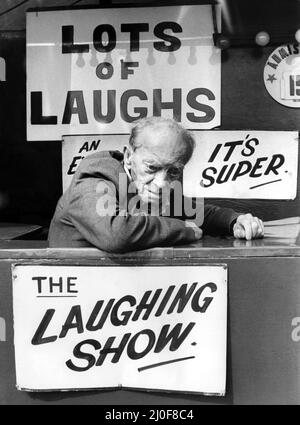 A picture from a series of humurous novelty images taken by Sunday People photographer Dennis Hutchinson. - He said: 'Laugh, I'd rather be at home watching paint dry.'    Circa: 1980 Stock Photo