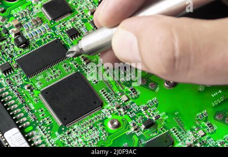 Repairing Printed circuit board Stock Photo