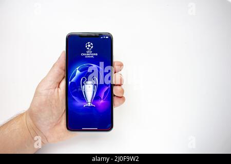 Calgary, Alberta, Canada. Aug 15, 2020. A person holding an iPhone 11 Pro Max with the UEFA Champions League application. Stock Photo