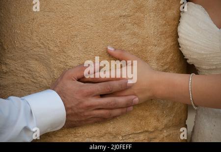 Young adults Holding hands Stock Photo