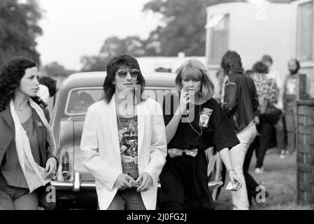 Rolling stones: Ronnie Wood with wife Jo Wood at Knebworth Pop Festival for a special appearance with fellow Rolling Stone Keith Richards and The New Barbarians.12th August 1979. Stock Photo